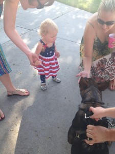 This cute little kiddo who wanted to pet Shae. Looking very American!