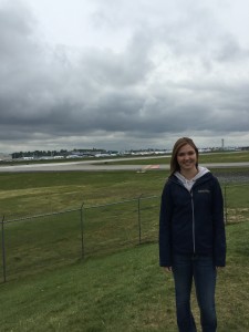 Standing at Paine Field with the Boeing Factory and flight line in the background.