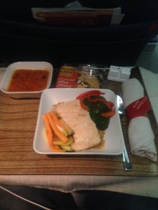 Upgraded to First Class on our flight between MSP and MCO. For dinner was a tomato basil soup, followed by a salmon with basmati rice, and a toffee almond cookie for dessert.