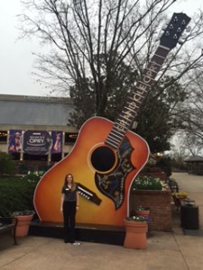Standing in front of the Grand Ole Opry