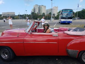 This is a picture of me in one of those classic cars in Cuba!